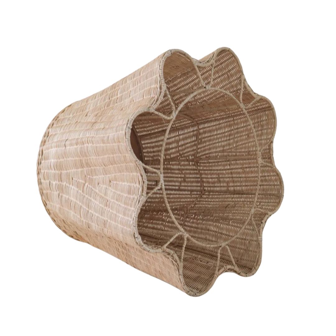 Woven rattan side table on a white background