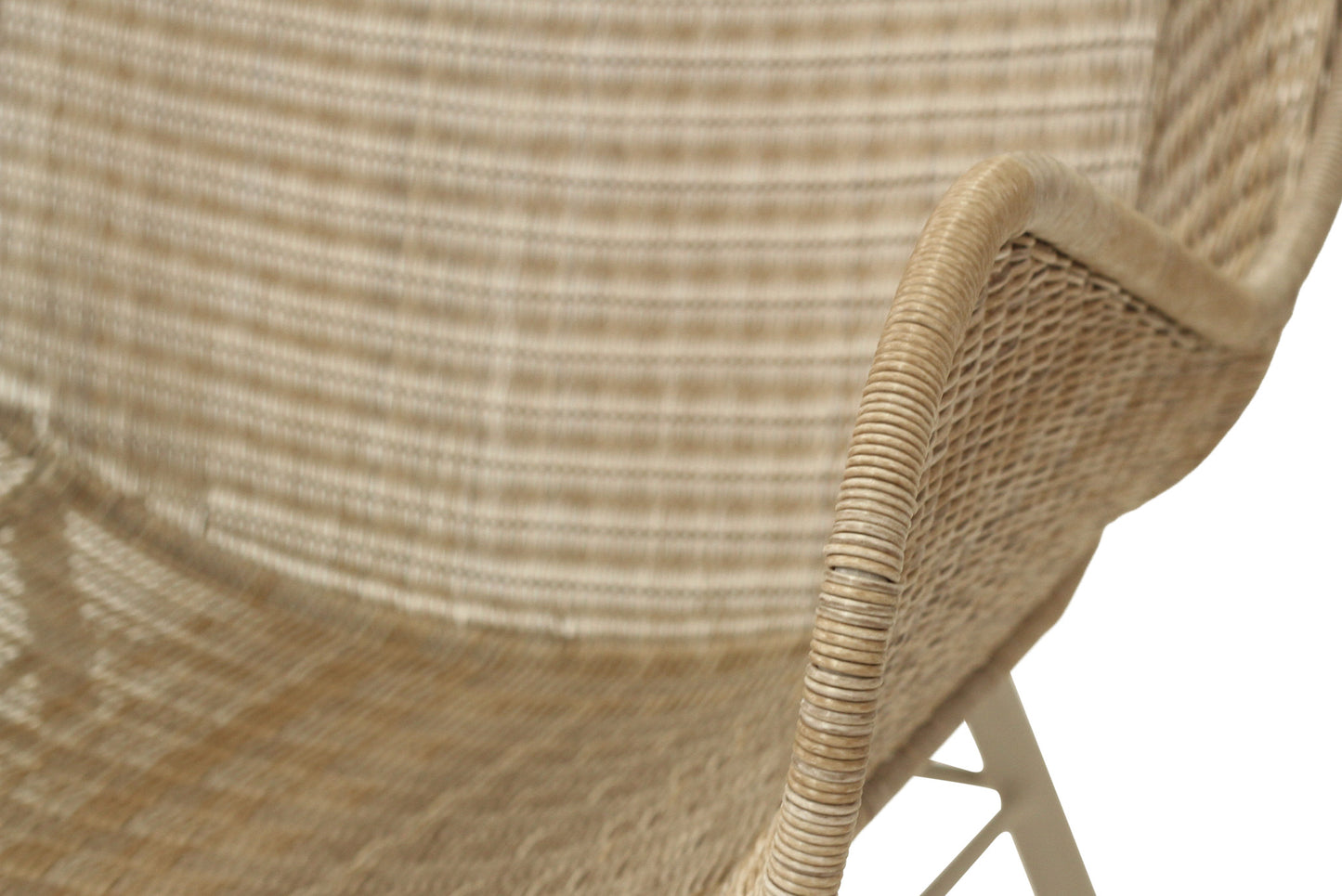 Close-up of a wicker chair with a neutral background
