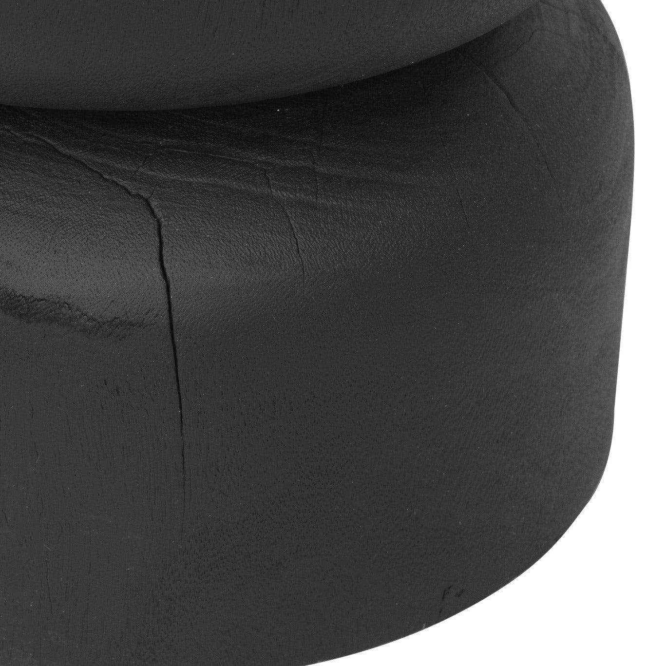Close up of a Black round stump stool side table on a white
