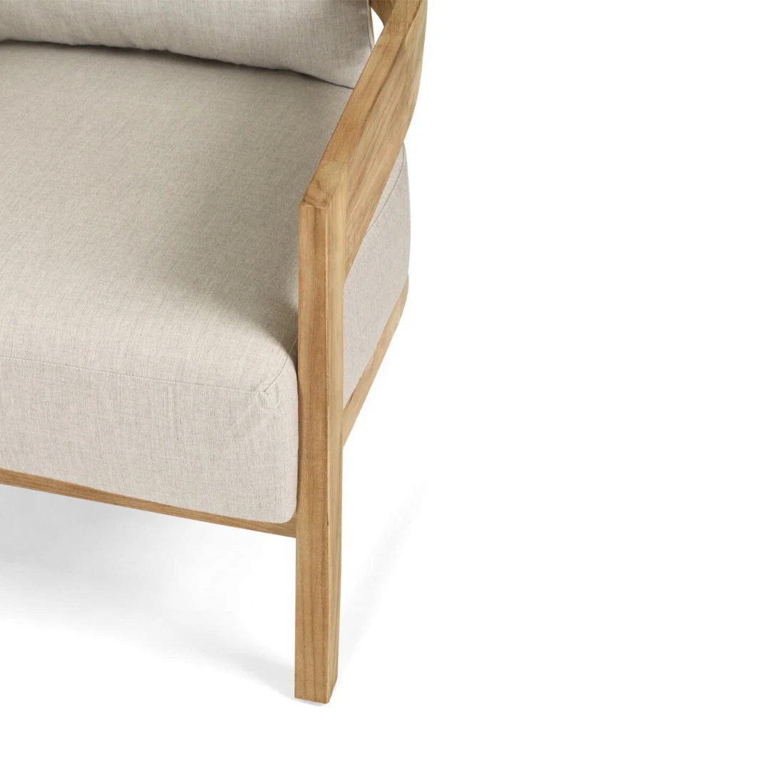 Outdoor teak armchair Chair with light grey cushion on a white