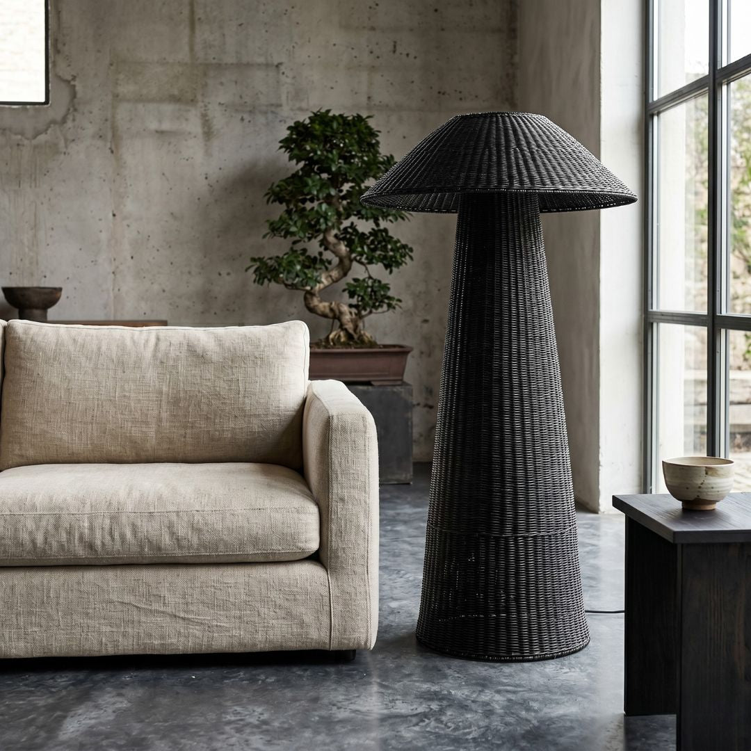 Malawi Cane Floor Lamp in Black in a living room setting