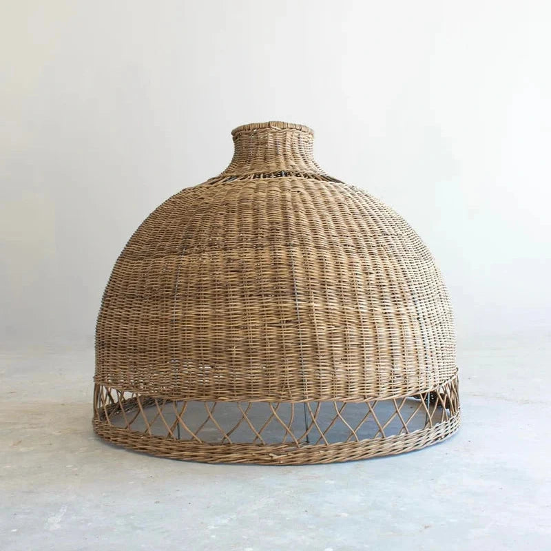 Woven rattan ceiling light fixture on a white background