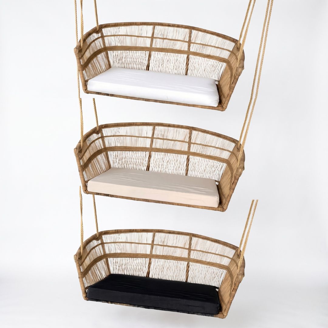 Three-tiered hanging chair with cushions on a white background