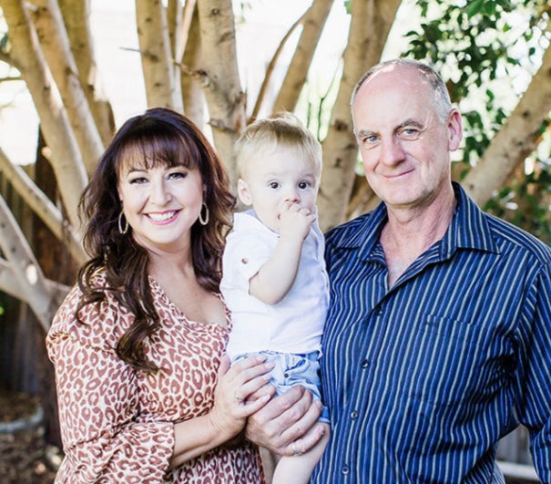 photo portrait of Sun Republic owner Sharlene smiling with her fiancé and grandson