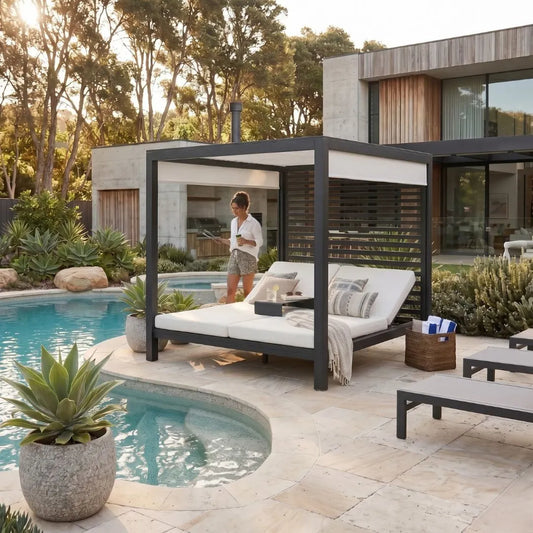 Outdoor patio area with a cabana, lounge chairs, and pool in a modern home setting.