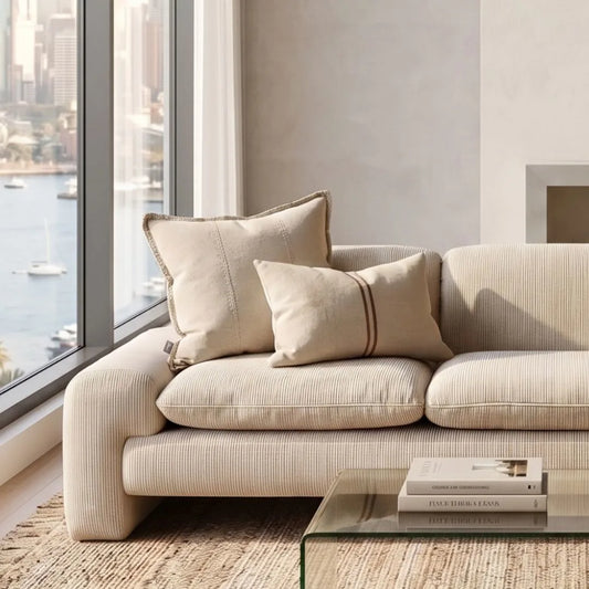 Orion Natural cushion on modern sofa