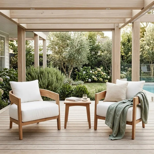 Outdoor patio with wooden chairs and a small table on a wooden deck.