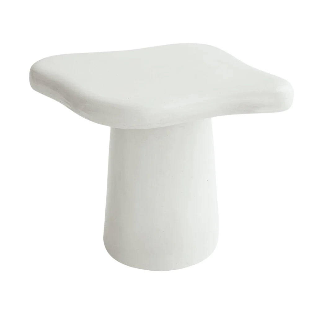 White concrete side table on a white background
