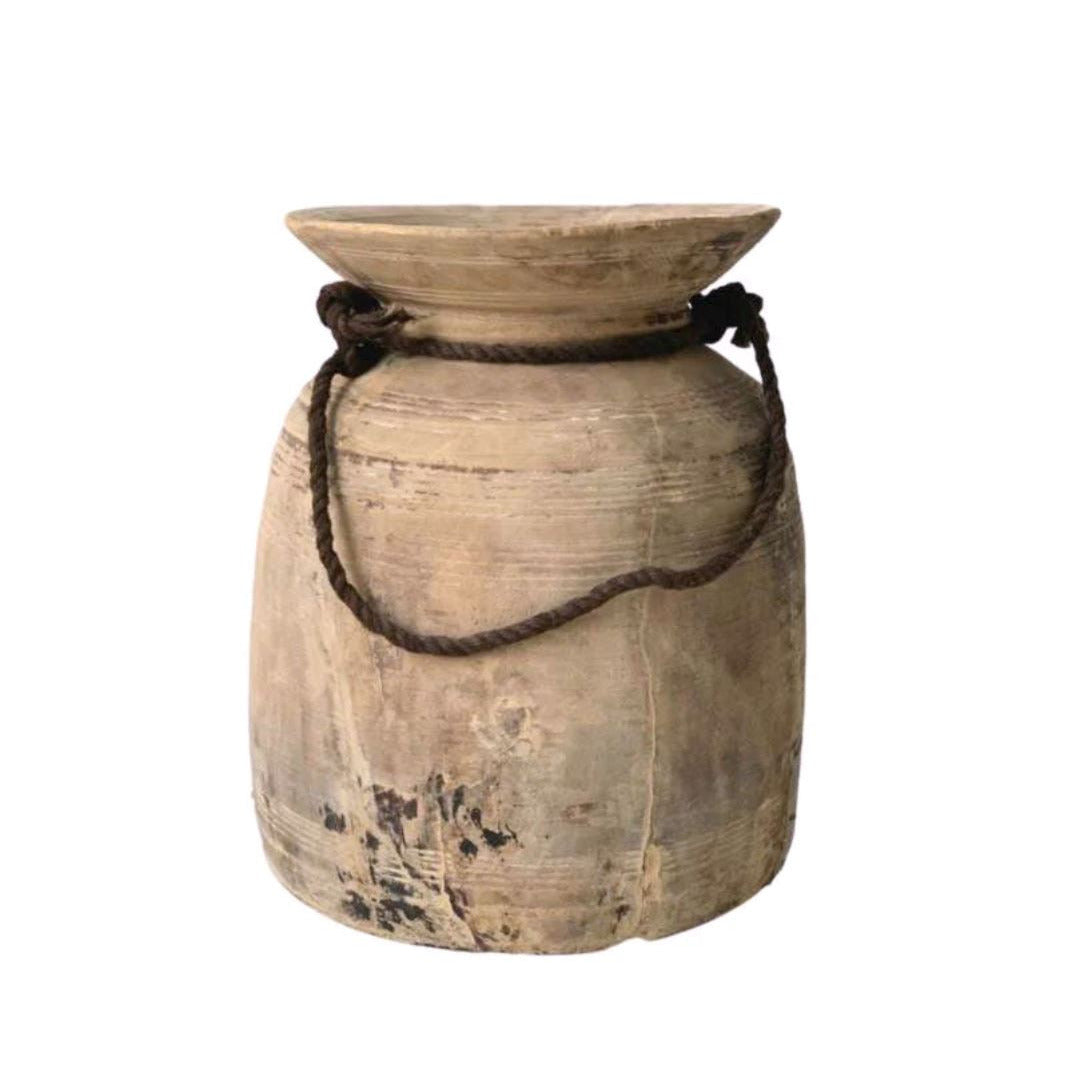 Vintage Urn with a rope handle on a white background