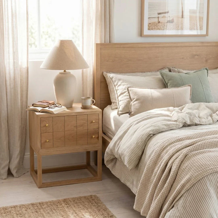 American Oak bedside table nightstand in a modern bedroom setting.