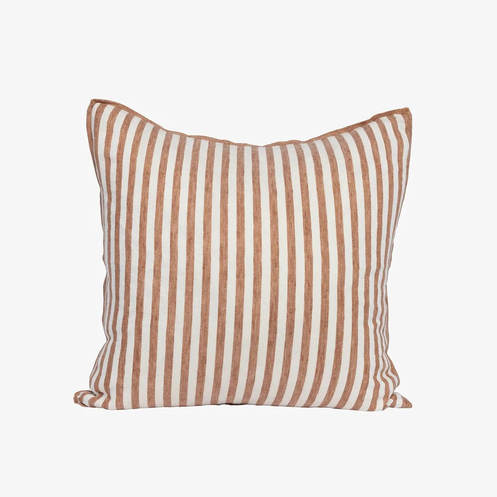 A square throw pillow with vertical stripes in a warm terracotta brown and off-white, shown against a plain light gray background.