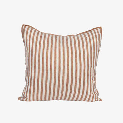 A square throw pillow with vertical stripes in a warm terracotta brown and off-white, shown against a plain light gray background.