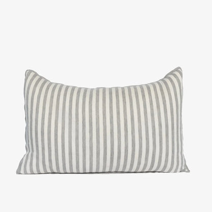 A rectangular throw pillow with vertical green and off-white stripes, shown against a plain light gray background.