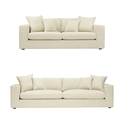Two beige sofas on a white background