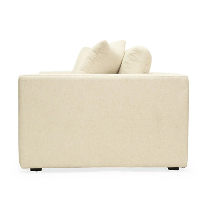 Beige sofa with two cushions on a white background