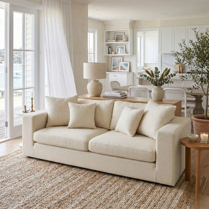 Beige sofa in a bright living room with decor elements