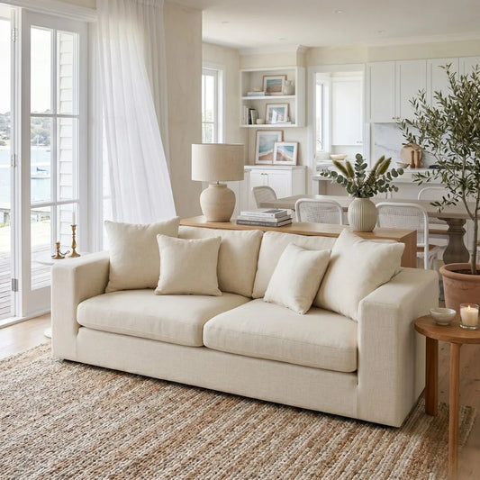 Beige sofa in a bright living room with decor elements