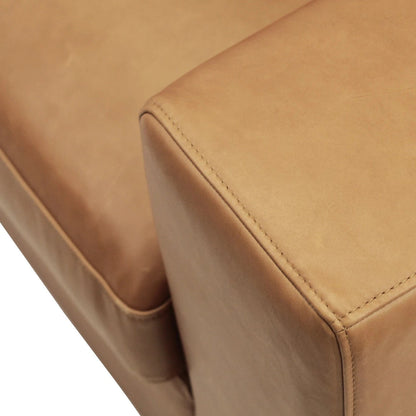 Close-up of a brown leather sofa