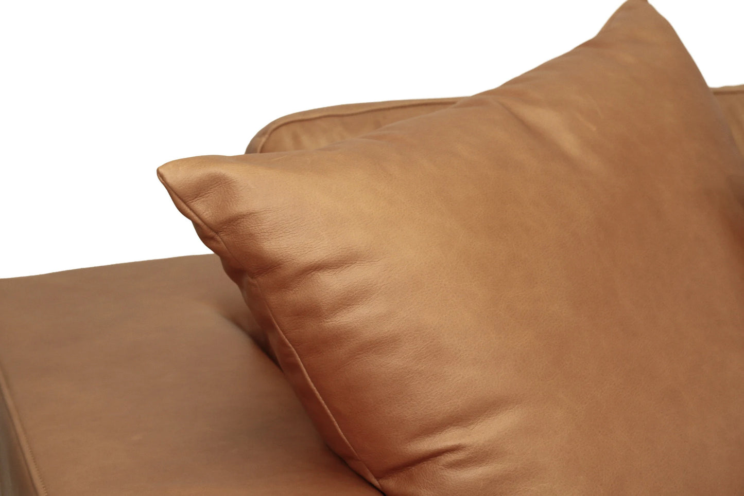 Brown leather cushion with a white background