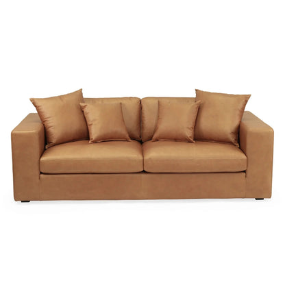 Tan brown saddle leather sofa with cushions on a white background from Sun Republic