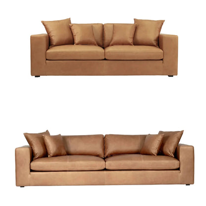 Brown leather 3 and 4 seater sofa with cushions on a white background