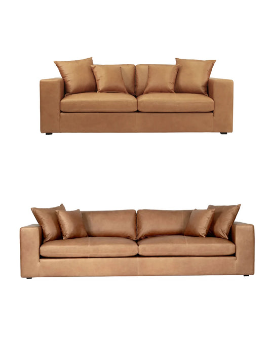 Brown leather 3 and 4 seater sofa with cushions on a white background