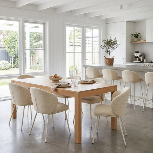 Modern kitchen with wooden dining table and beige chairs