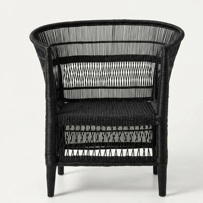 Black wicker armchair on a white background