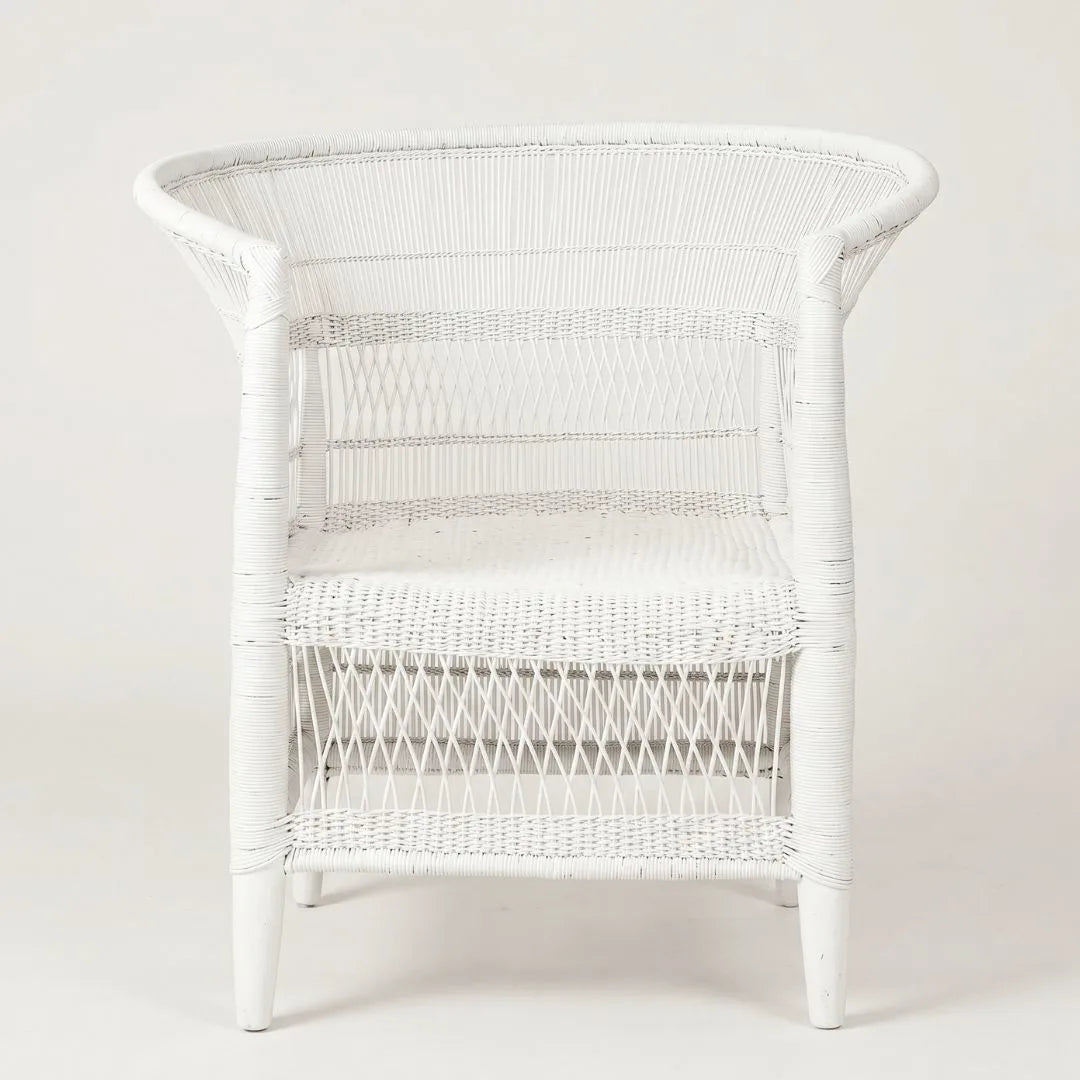 White wicker chair on a white background