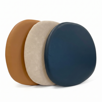 Three dining chair seat pad cushions in tan brown, beige khaki, and black on a white background