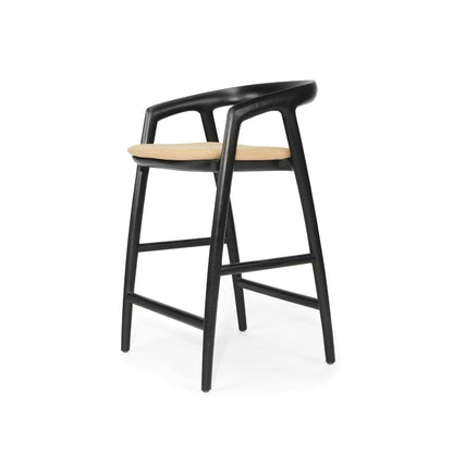 Bar stool with black frame and wooden seat on a white background