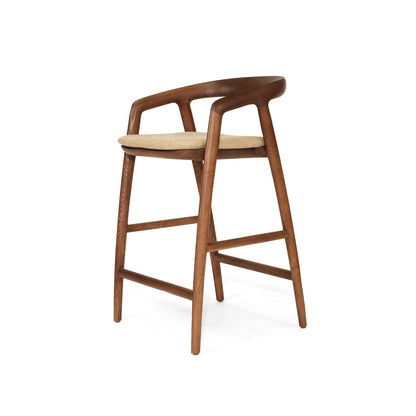 Wooden bar stool with beige seat on a white background