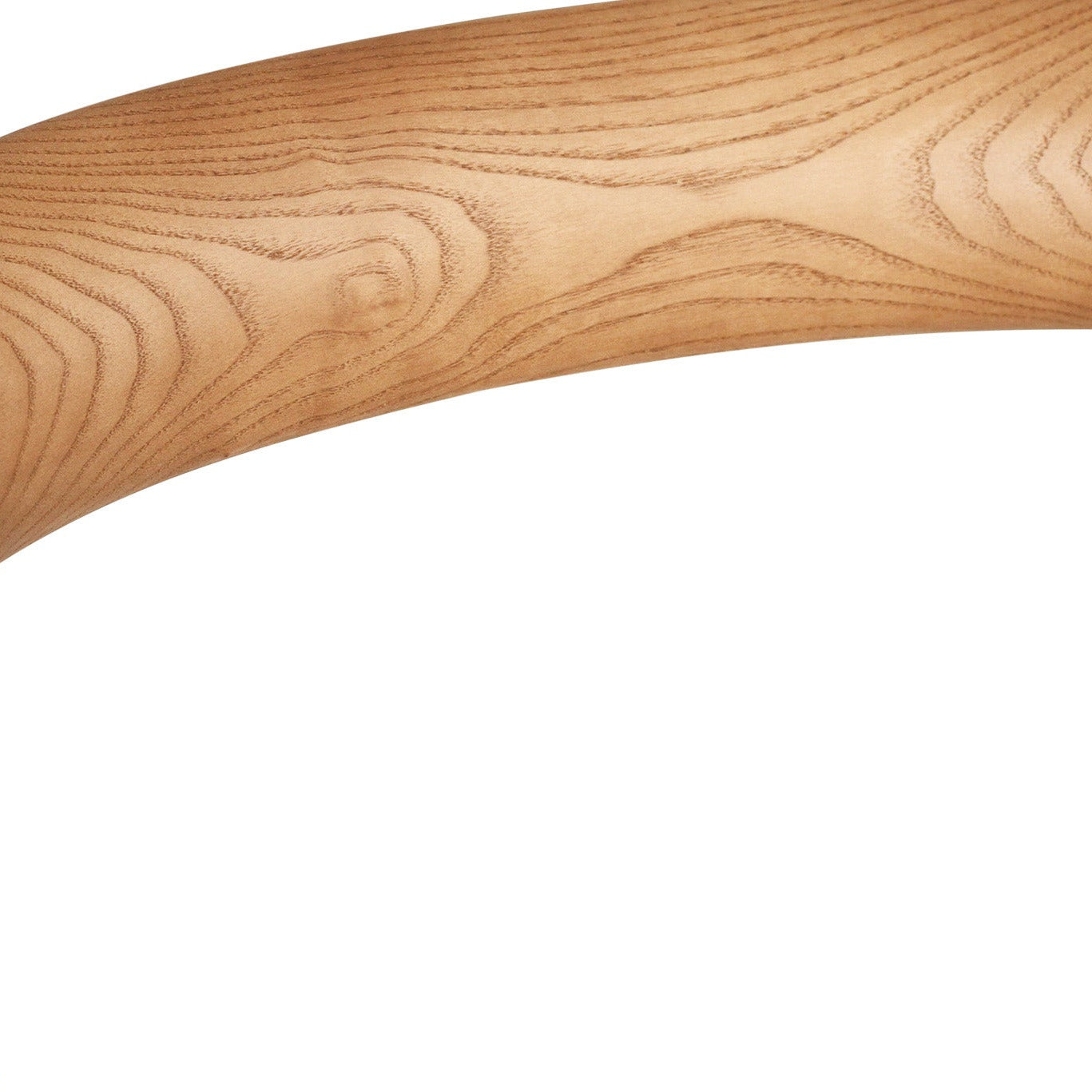 Close-up of a wooden chair arm on a white background