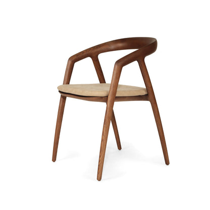 Wooden chair with beige cushion on a white background