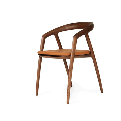 Wooden chair with a brown cushion on a white background