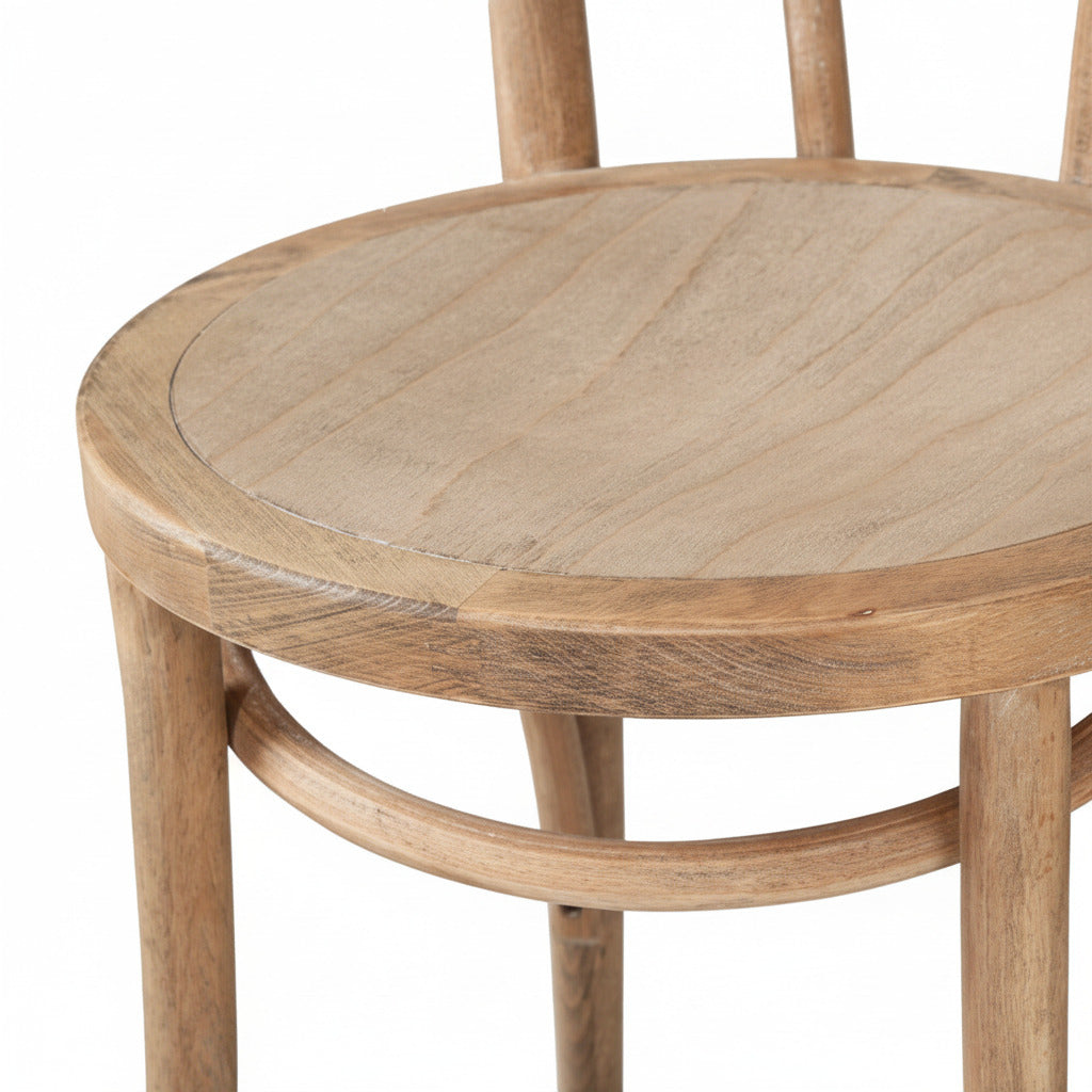 Wooden round table with four matching chairs on a white background