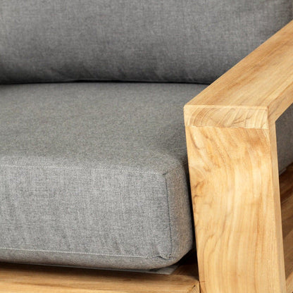 Teak Outdoor armchair with gray cushions on a white background