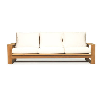 Wooden sofa with white cushions on a white background