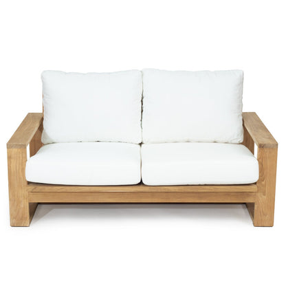Solid Teak Outdoor sofa with white Sunbrella weather proof cushions on a white background
