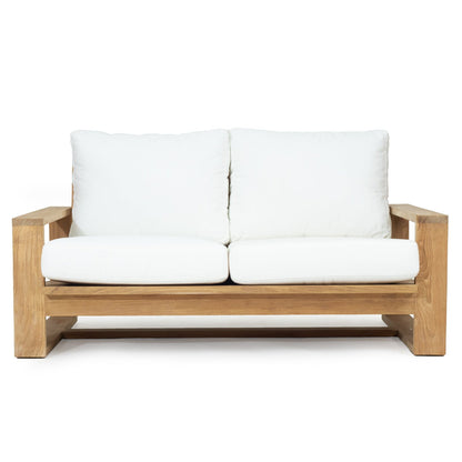 Solid Teak Outdoor sofa with white Sunbrella weather proof cushions on a white background
