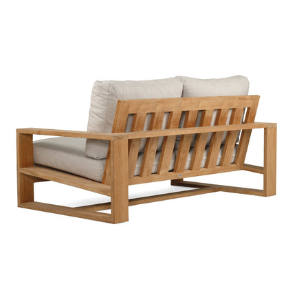 Solid Teak Outddoor sofa with beige silver Sunbrella weather proof cushions on a white background