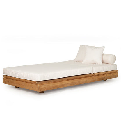 Modern Teak outdoor sunlounge with white cushions on a white background 