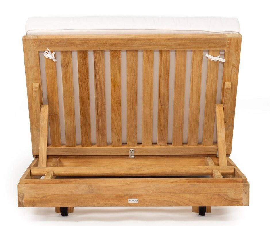 Teak outdoor sunlounge with white cushions on a white background 