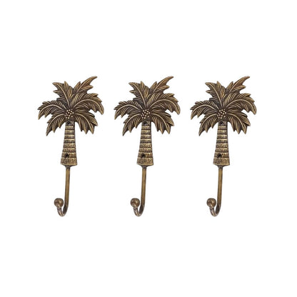 Three palm tree-shaped hooks on a white background