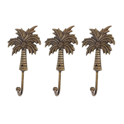 Three palm tree-shaped hooks on a white background
