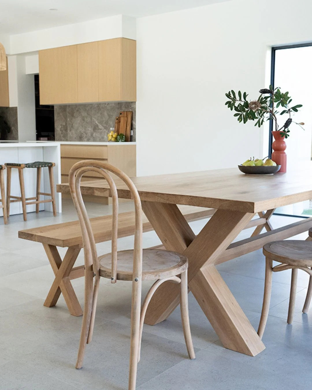 Modern kitchen with wooden dining table and chairs