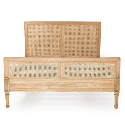 Wicker bed frame with headboard on a white background