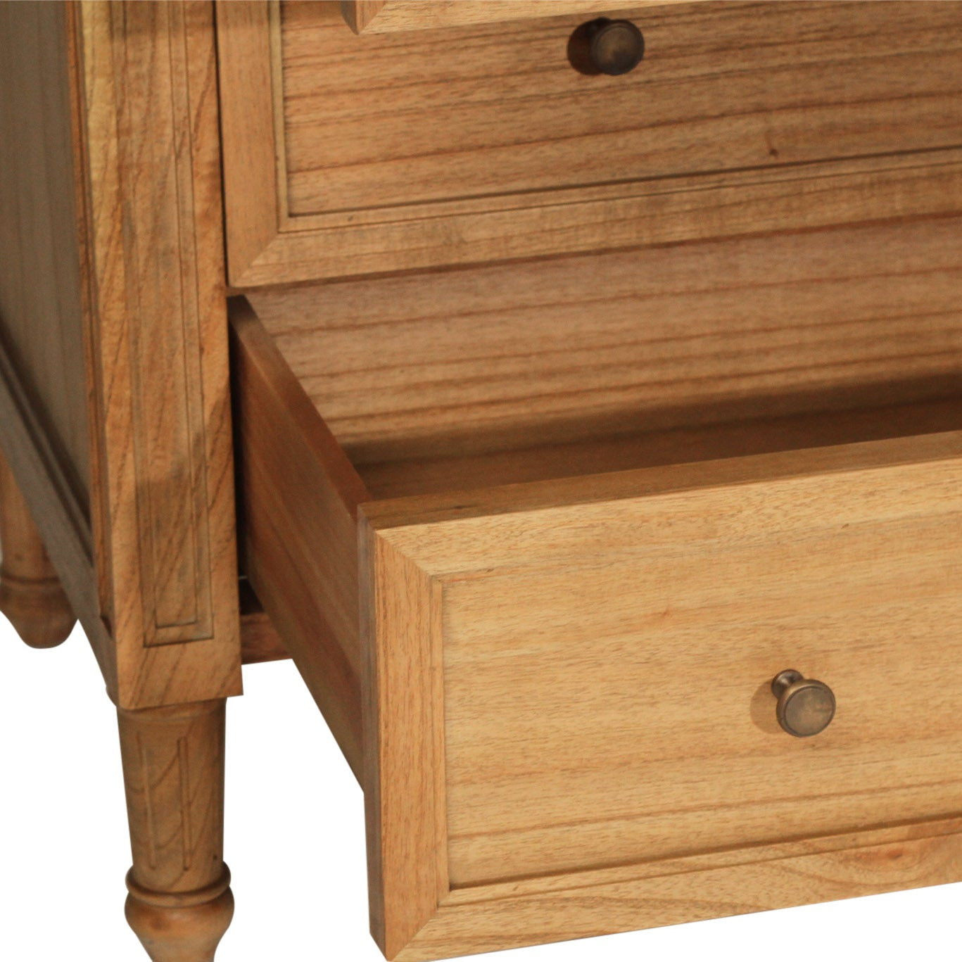 Wooden dresser with open drawer on a white background