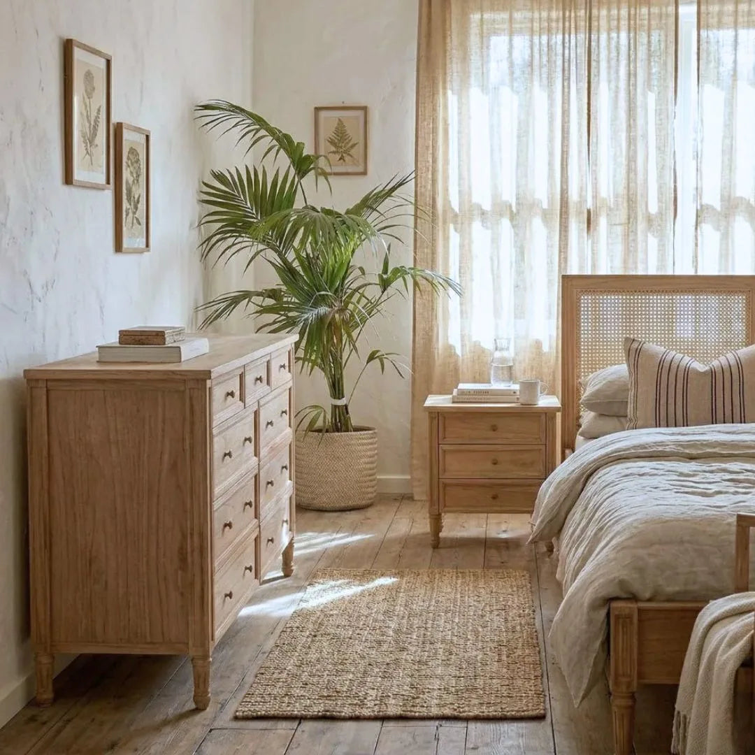 Cozy bedroom with sun republic cayman wooden dresser, bedside table and bed