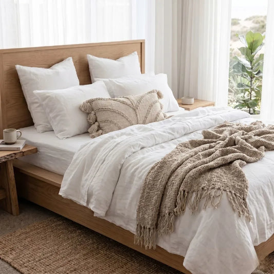 Chloe Shell Embossed Cushion Cover on on modern coastal boho styled bedroom by Sun Republic
